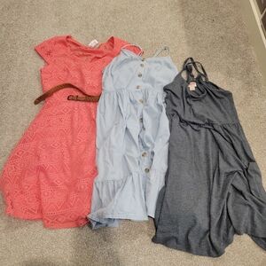 Trio of Dresses in Pink, Light Blue, and Gray